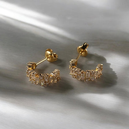 Half moon studs with square zircons